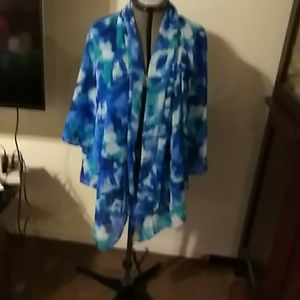 Blue and green and white jacket. Very flowy.